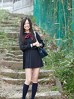 Mayumi Yamanaka Asian takes a walk in her city after classes